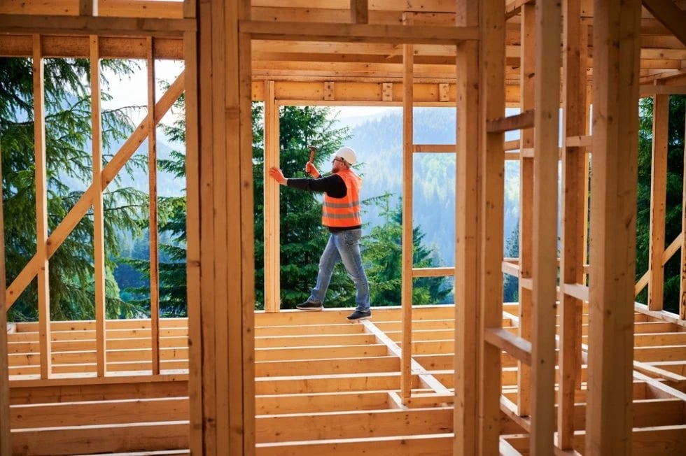 A carpenter working on a custom home